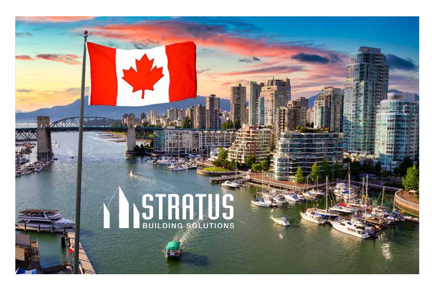 Cityscape in Canada featuring the Canadian flag in the foreground and a marina, bridge, and skyscrapers in the background.