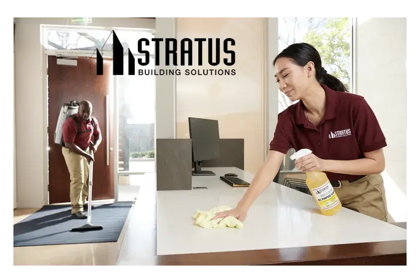 Side-by-Side Images of a Stratus Employee Vacuuming a Floor Mat and a Stratus Employee with a Spray Bottle Wiping a Desk